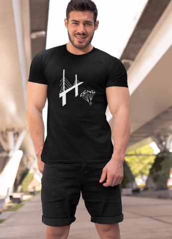 This black unisex t-shirt is everything you have dreamed of and more. It feels soft and lightweight with the right amount of stretch. It is comfortable and flattering for both men and women and with a bridge and ‘SEND IT’ shaped as a basejumper print on the front. Available in several colours.