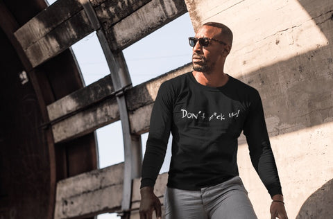 Black long sleeve t-shirt will enrich any wardrobe with its casual look. It is soft ringspun cotton and has taped neck and shoulders and hemmed sleeves. It gives a cool appearance with the Don't F*ck Up print across the chest.