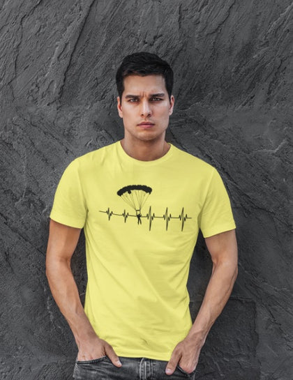 This yellow unisex t-shirt with black print is everything you have dreamed of and more. It feels soft and lightweight with the right amount of stretch. It is comfortable and flattering for both men and women and with heartbeat with a skydiver print on the front. Available in several colours.