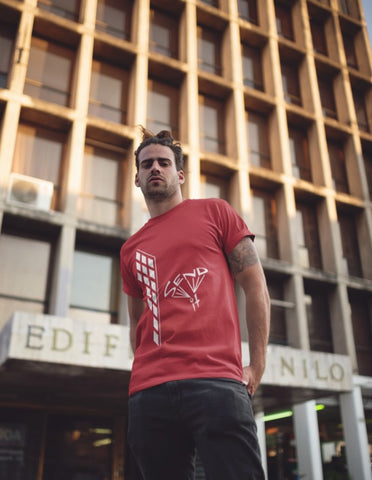 This red unisex t-shirt is everything you have dreamed of and more. It feels soft and lightweight with the right amount of stretch. It is comfortable and flattering for both men and women and with a building and ‘SEND IT’ shaped as a basejumper print on the front. Available in several colours.
